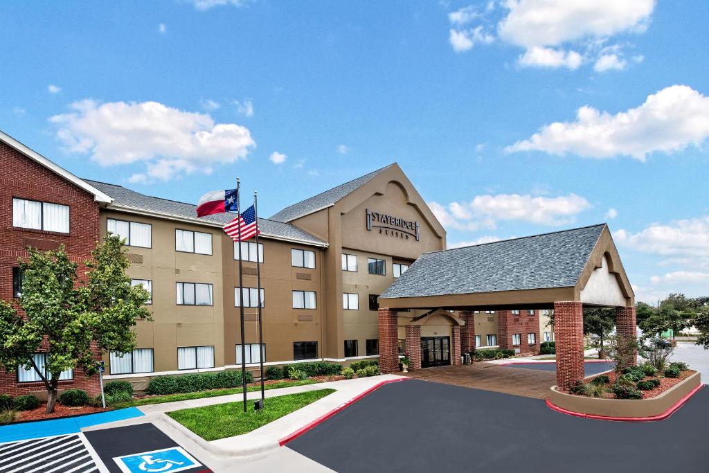 a rendering of the front of a hotel at Staybridge Suites Lubbock-University Area, an IHG Hotel in Lubbock