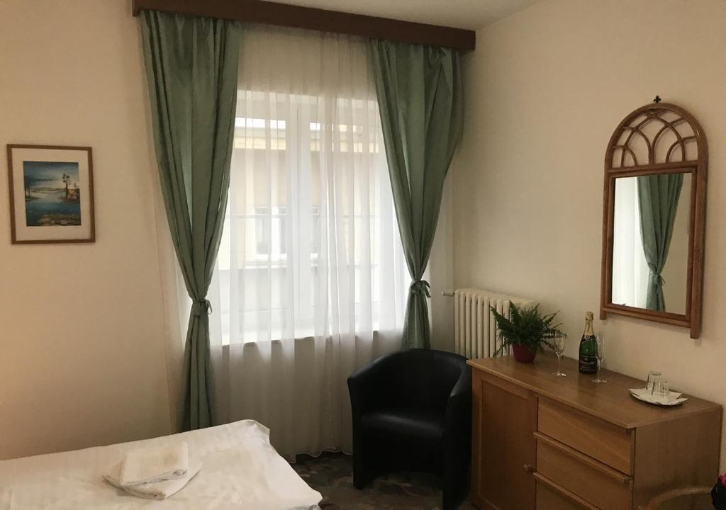 Postel nebo postele na pokoji v ubytování Hotel Otar