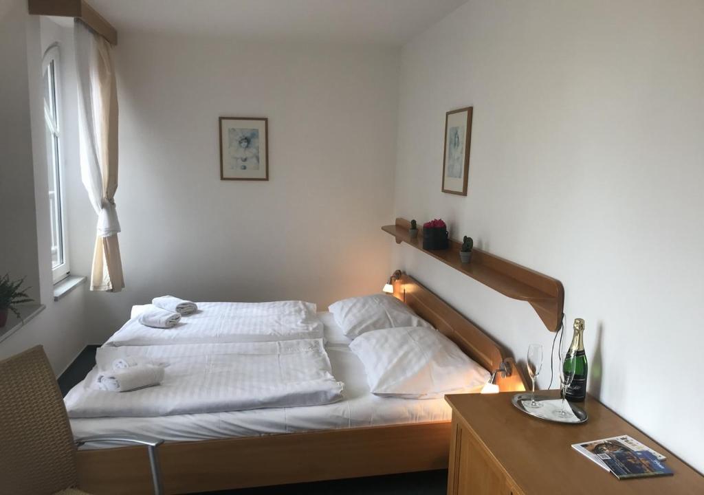 Postel nebo postele na pokoji v ubytování Hotel Otar