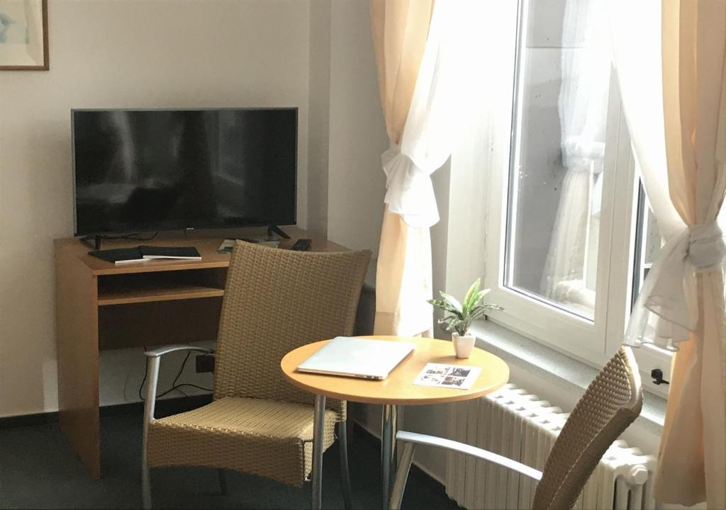 TV a/nebo společenská místnost v ubytování Hotel Otar