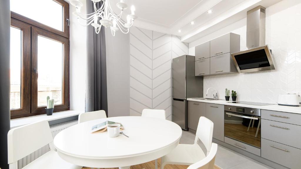 Kuchyňa alebo kuchynka v ubytovaní Native Apartments Blich 7