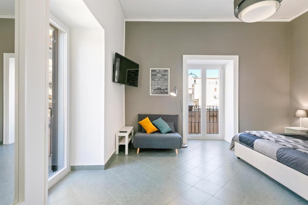 Televízia a/alebo spoločenská miestnosť v ubytovaní Stylish Flat Maqueda