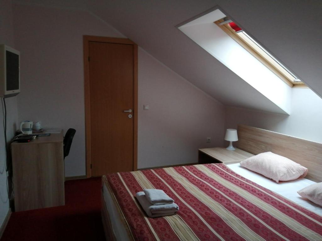 Postel nebo postele na pokoji v ubytování Idilė Bed & Breakfast - Visaginas