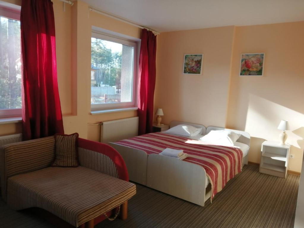 Postel nebo postele na pokoji v ubytování Idilė Bed & Breakfast - Visaginas