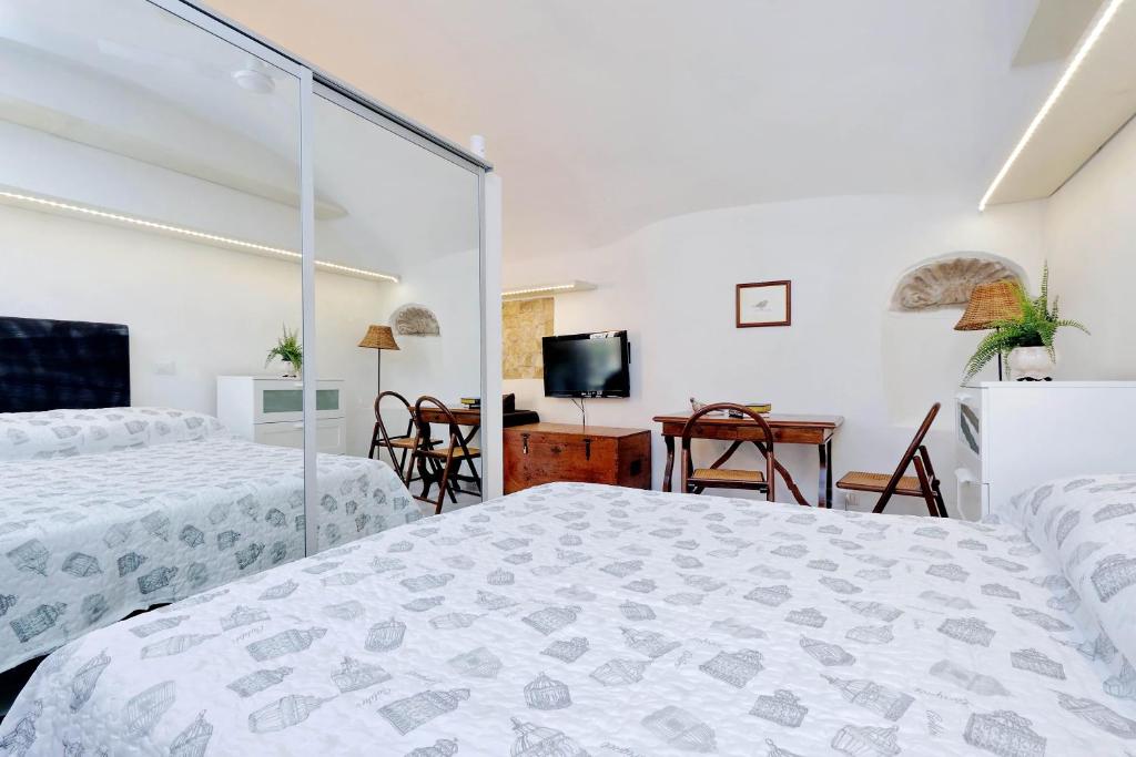 Posteľ alebo postele v izbe v ubytovaní Relax Chiavari House