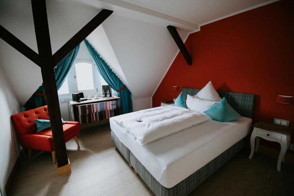 Un pat sau paturi într-o cameră la Palace St. George