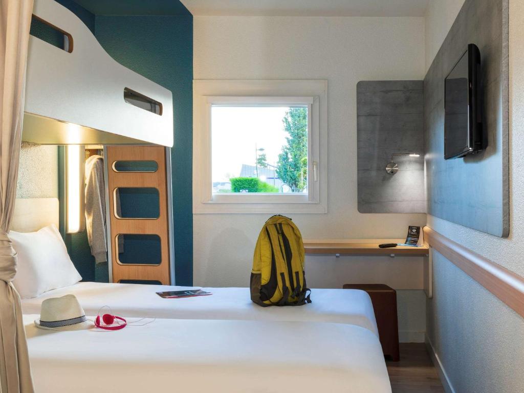 Un ou plusieurs lits dans un hébergement de l'établissement ibis budget Berck Sur Mer