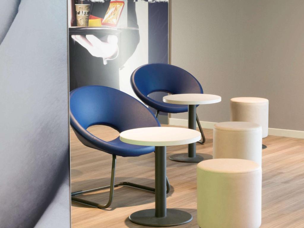 Posezení v ubytování Hotel Ibis Budget Lyon Eurexpo -