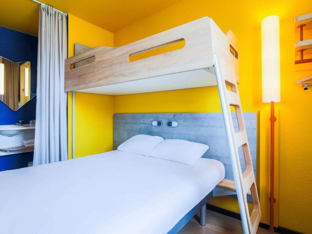 Llit o llits en una habitació de Ibis Budget Albi Centre