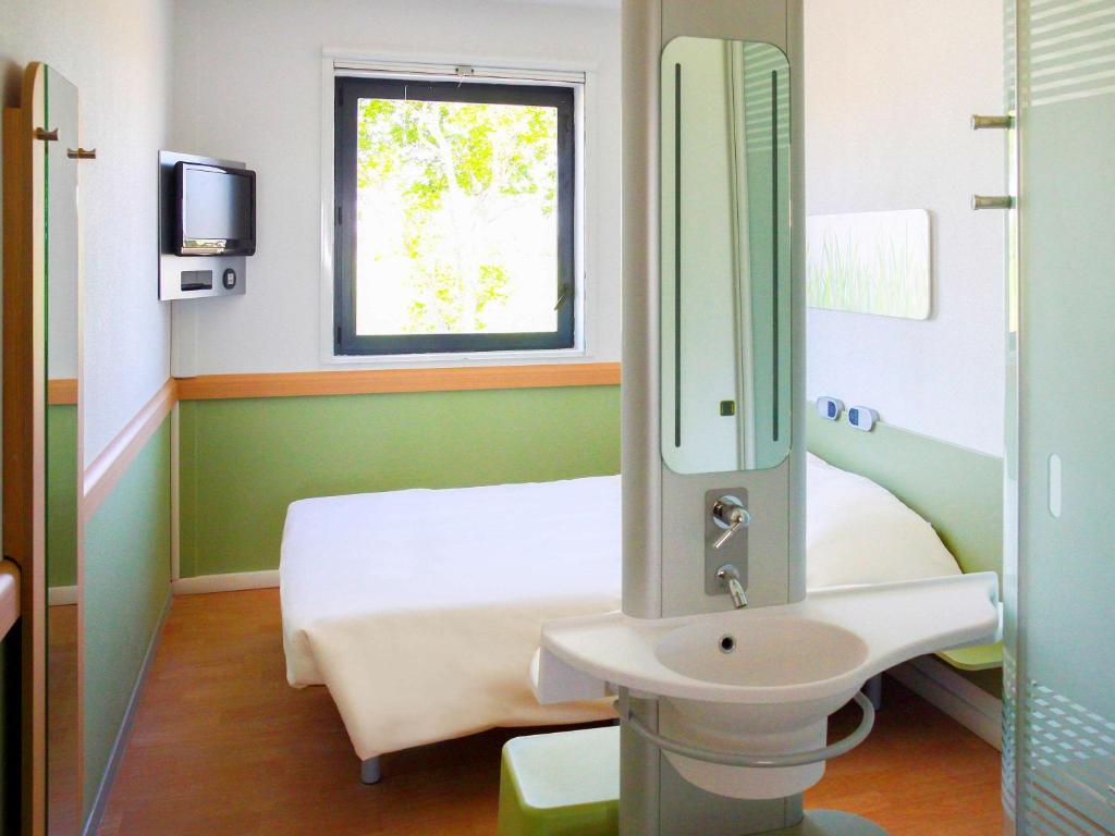 Koupelna v ubytování ibis budget Castelnaudary - A61