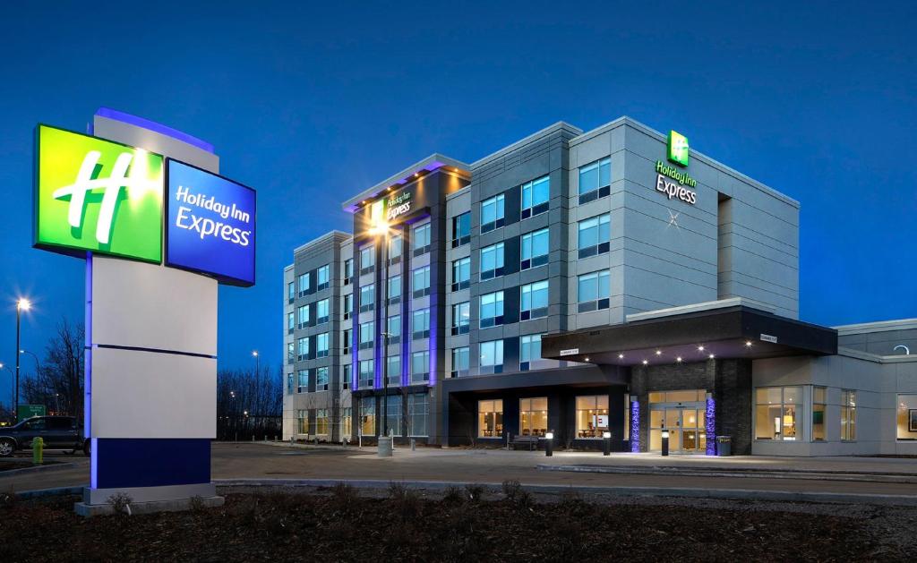 a building with a sign in front of it at Holiday Inn Express - Red Deer North, an IHG Hotel in Red Deer