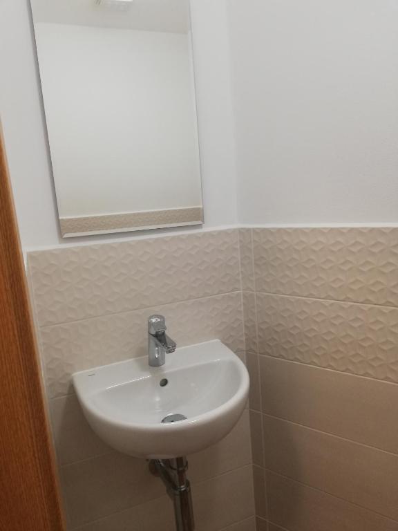 Kúpeľňa v ubytovaní Apartment MyMara No3