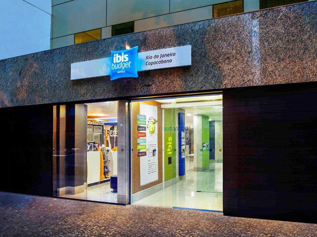 a building with a sign on the side of it at ibis budget RJ Copacabana in Rio de Janeiro