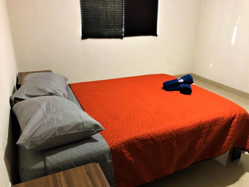 Postel nebo postele na pokoji v ubytování Hotel Morelia In