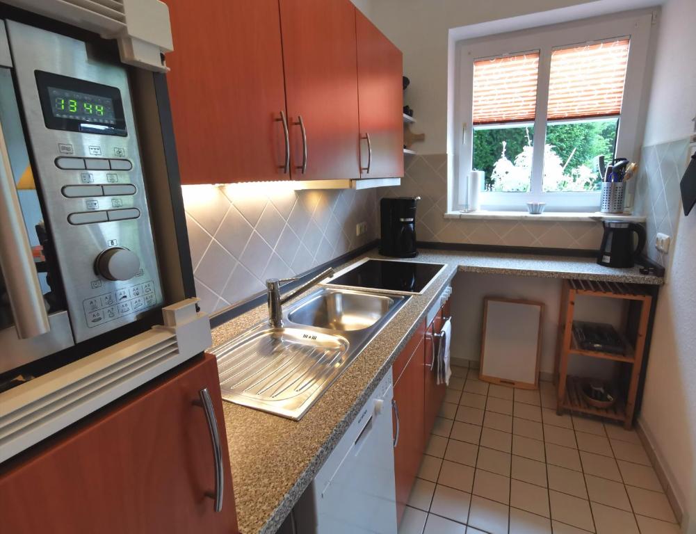 Kuchyň nebo kuchyňský kout v ubytování Apartments mit Flair
