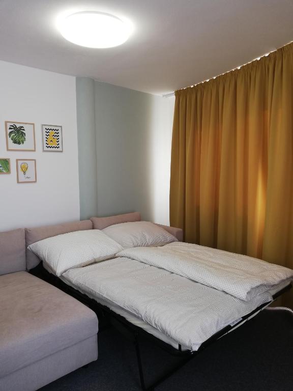 Posteľ alebo postele v izbe v ubytovaní Apartment MyMara No3