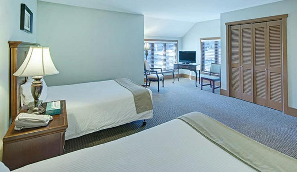 Postel nebo postele na pokoji v ubytování Pocono Villas Resort