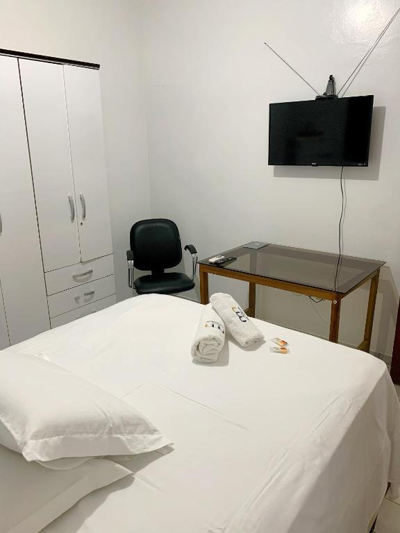 TV a/nebo společenská místnost v ubytování Hotel Morada Nobre
