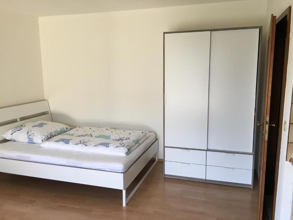 Ένα ή περισσότερα κρεβάτια σε δωμάτιο στο Apartment with Terrace