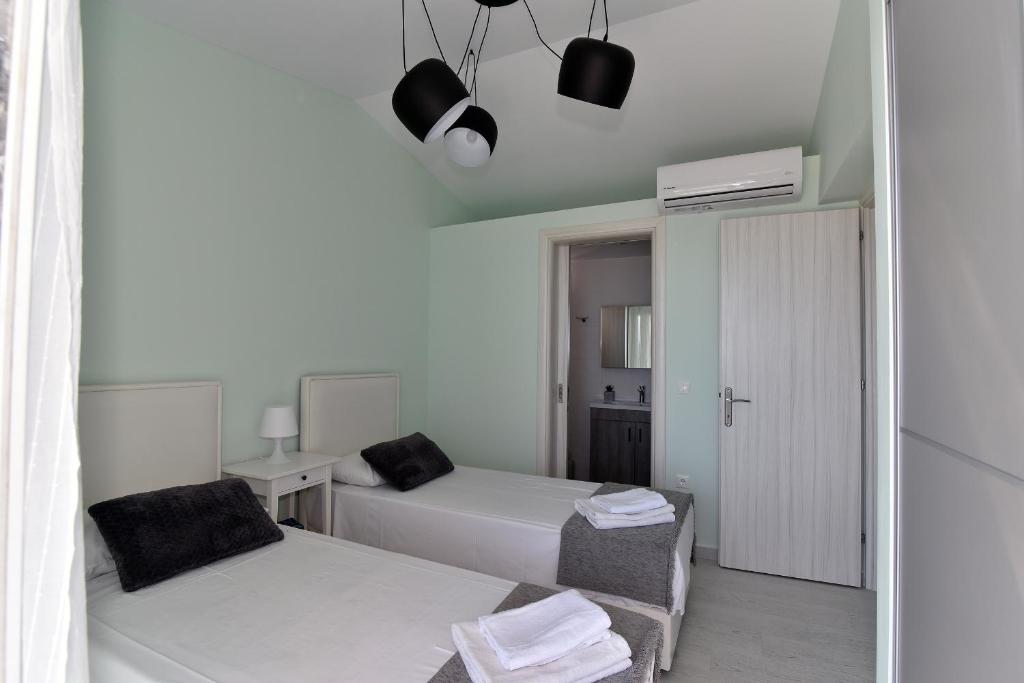 Posteľ alebo postele v izbe v ubytovaní Corfu Sea View Villa - Leo