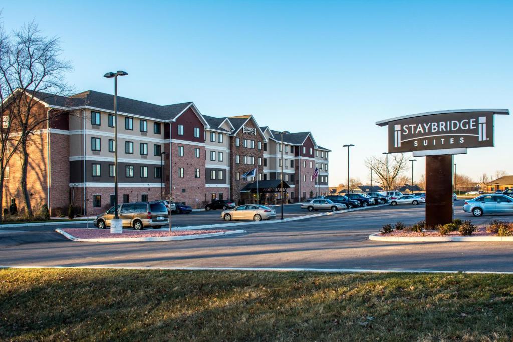 a street with cars parked in a parking lot at Staybridge Suites Schererville, an IHG Hotel in Schererville