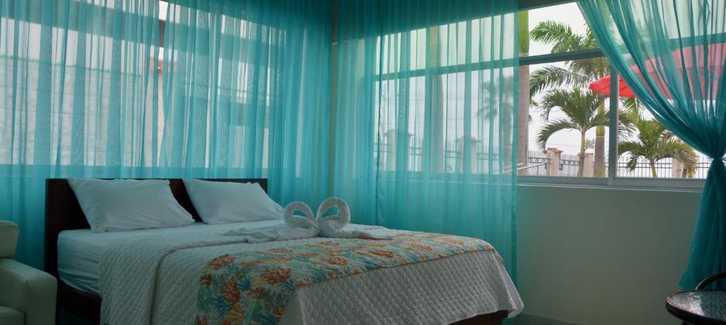 Postel nebo postele na pokoji v ubytování Hotel Casablanca CHIPIPE