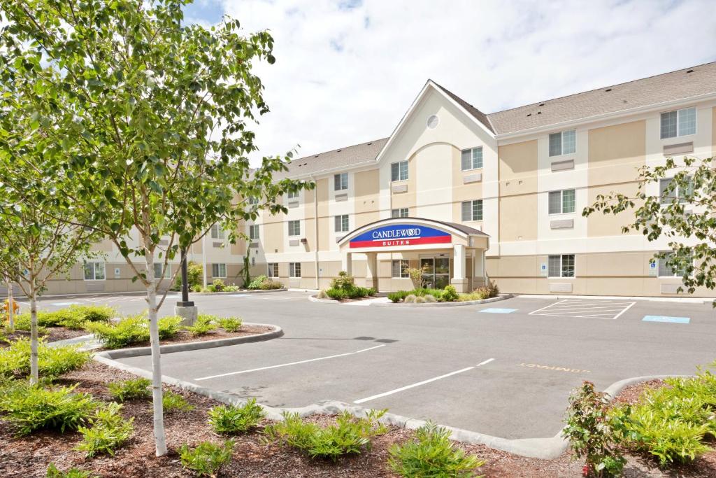 a rendering of a hotel with a parking lot at Candlewood Suites Oak Harbor, an IHG Hotel in Oak Harbor