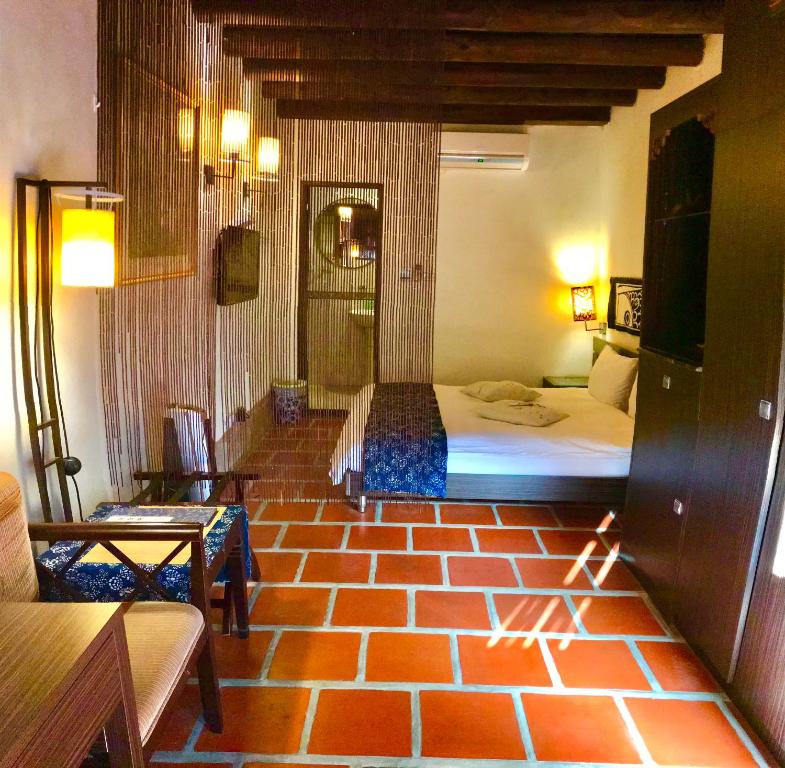 Postel nebo postele na pokoji v ubytování Grace Kinmen B&B