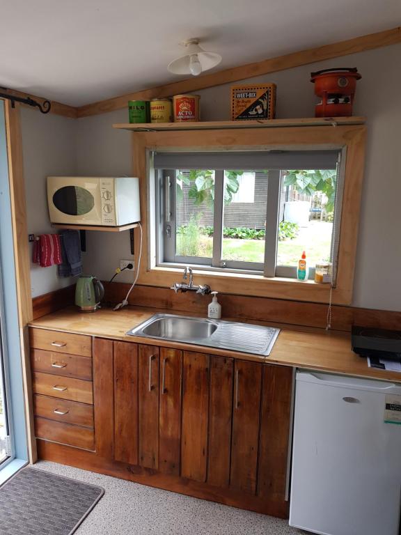 Kuchyň nebo kuchyňský kout v ubytování Smylies Accommodation