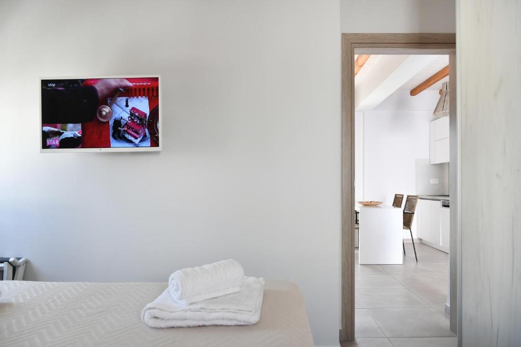 Posteľ alebo postele v izbe v ubytovaní Iresma Suites