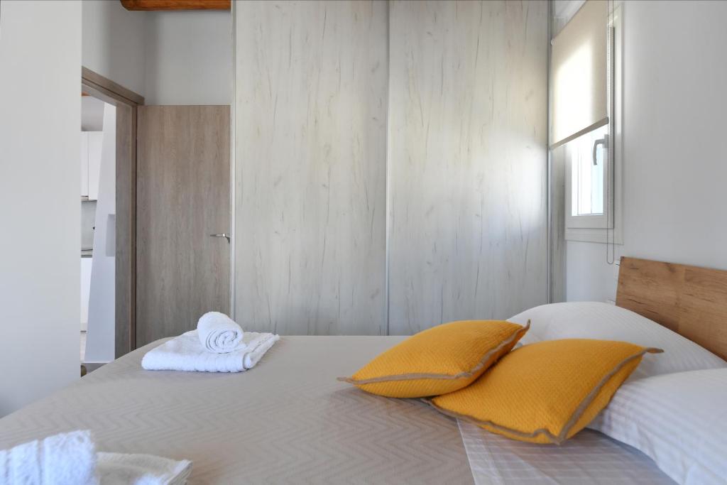 Posteľ alebo postele v izbe v ubytovaní Iresma Suites