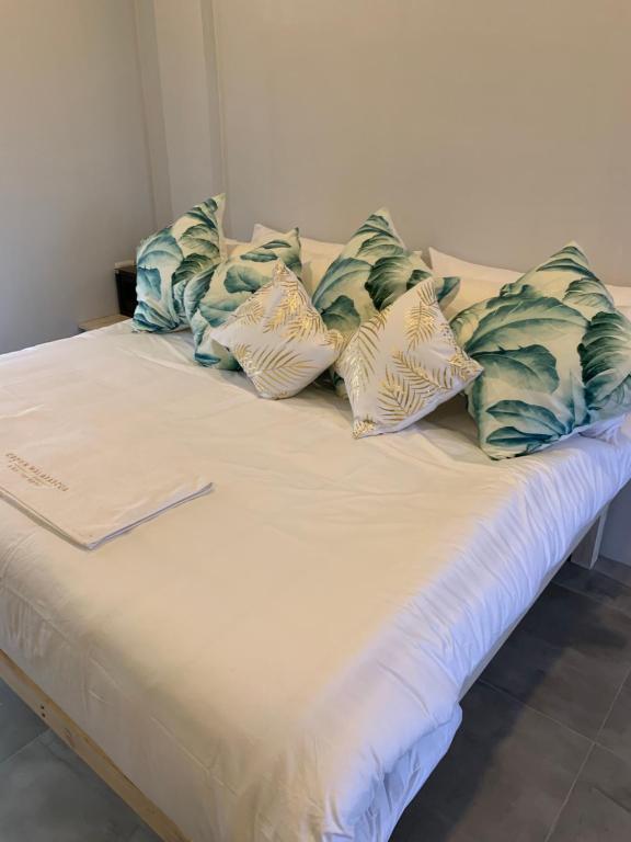 Postel nebo postele na pokoji v ubytování Crown Malapascua