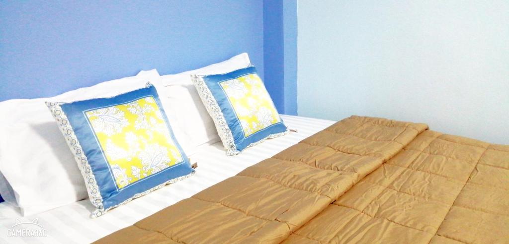 Postel nebo postele na pokoji v ubytování Khao Thong Home Stay
