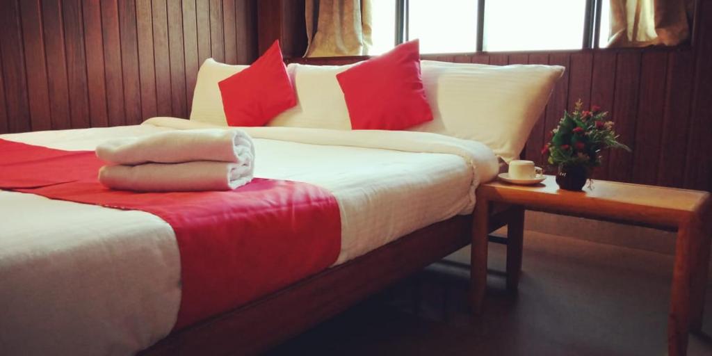 Postel nebo postele na pokoji v ubytování Hotel Tri-Star Residency