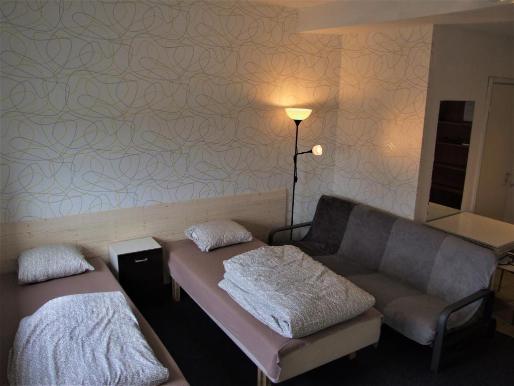 Postel nebo postele na pokoji v ubytování Jurgis Guest house