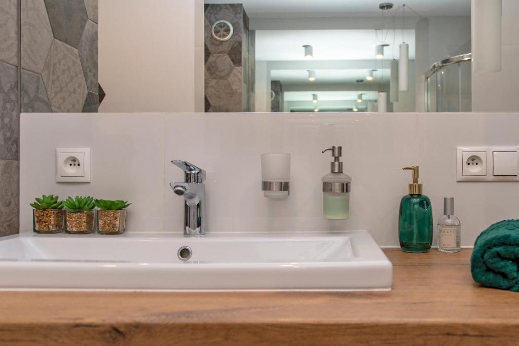 Kúpeľňa v ubytovaní 3D KOSCIUSZKI 19 Apartament