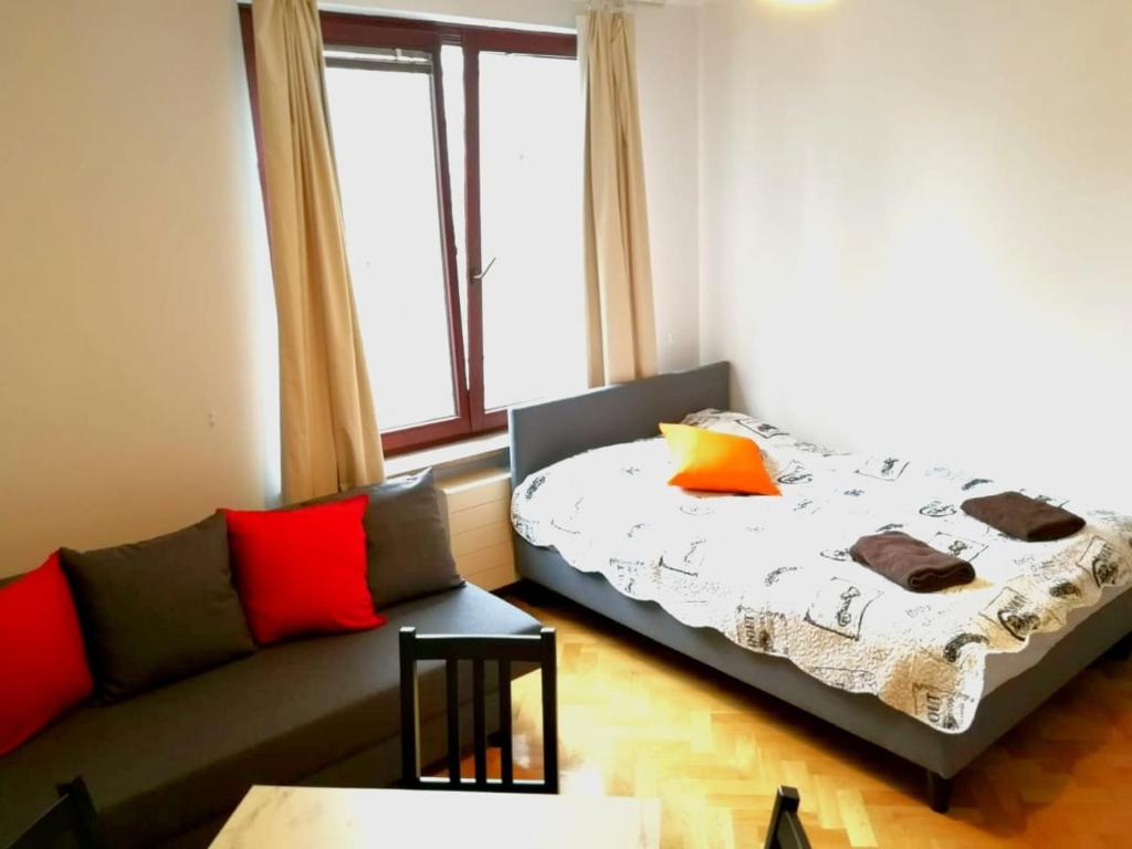 Posteľ alebo postele v izbe v ubytovaní Center Warsaw - Apartmenty Jana Pawła II