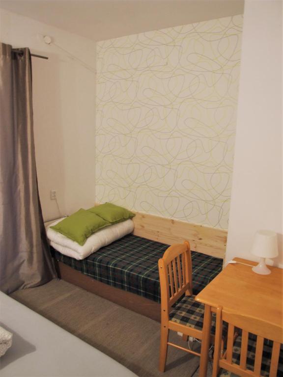 Postel nebo postele na pokoji v ubytování Jurgis Guest house