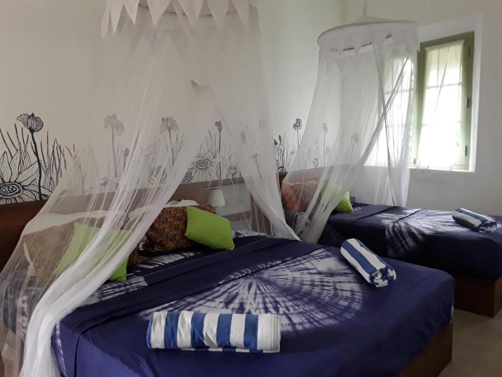 Postel nebo postele na pokoji v ubytování Casa Maria