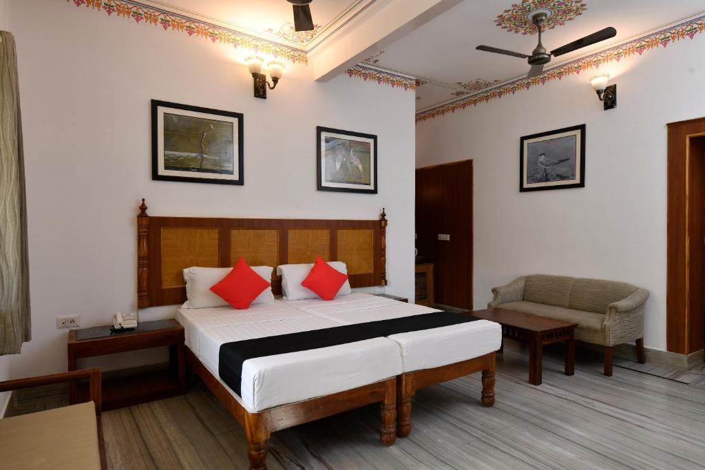 Postel nebo postele na pokoji v ubytování Hotel Sunbird