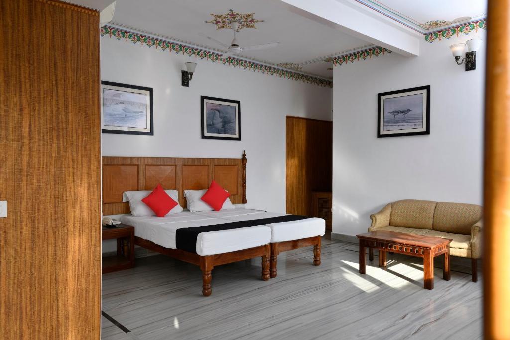 Postel nebo postele na pokoji v ubytování Hotel Sunbird