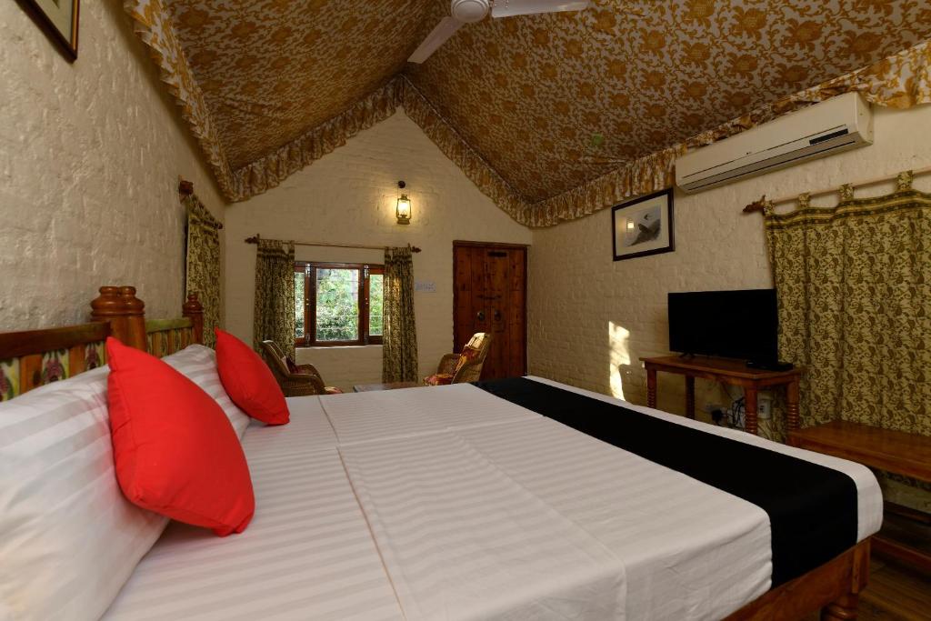 Postel nebo postele na pokoji v ubytování Hotel Sunbird