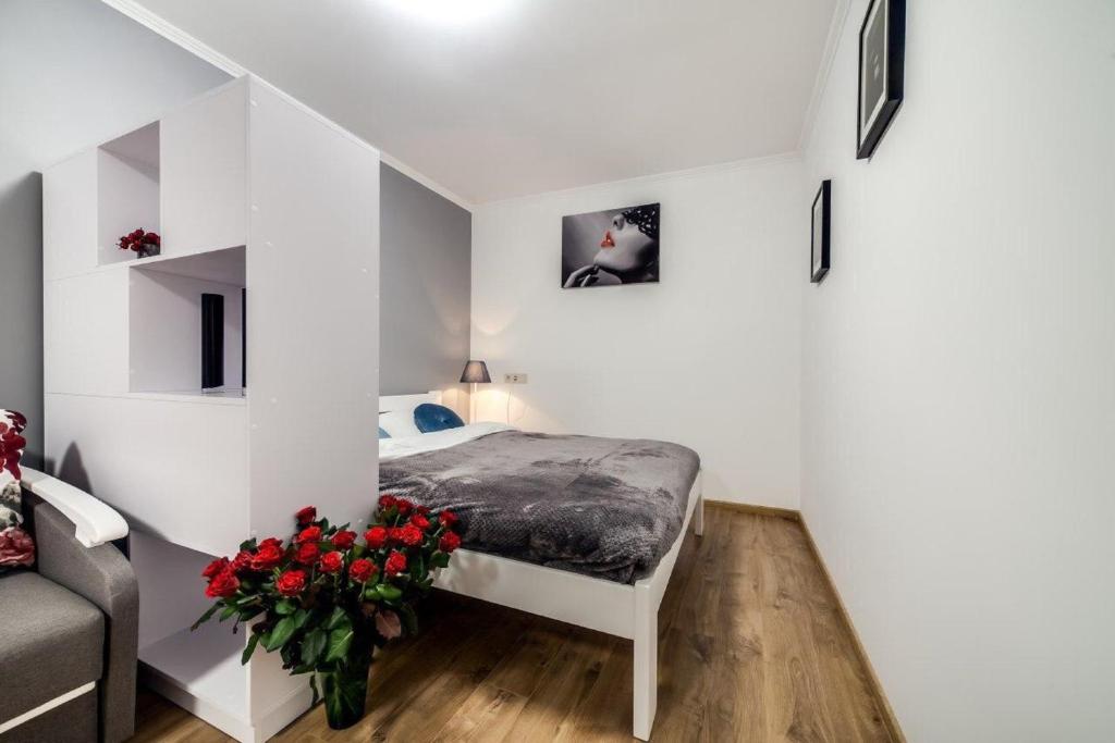 Кровать или кровати в номере Apartments in Rynok Square