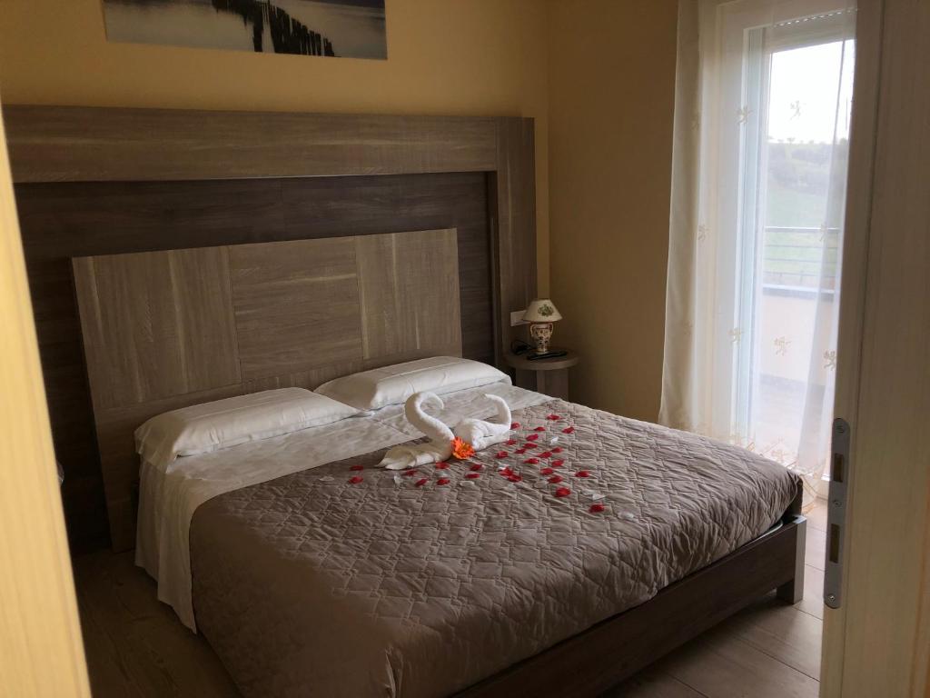 Postel nebo postele na pokoji v ubytování Cataleya Resort & Spa