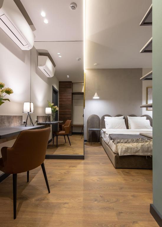 Postel nebo postele na pokoji v ubytování Allure Boutique Hotel