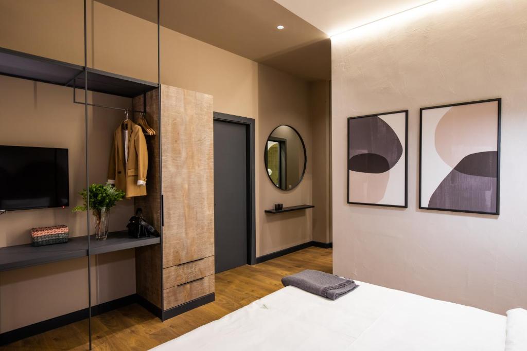 Postel nebo postele na pokoji v ubytování Allure Boutique Hotel