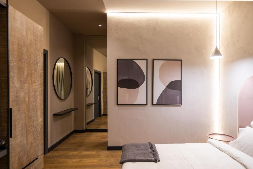 Postel nebo postele na pokoji v ubytování Allure Boutique Hotel