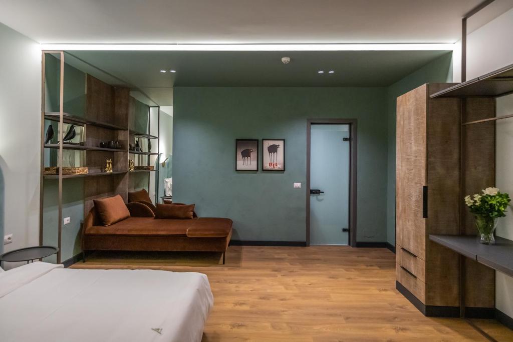 Postel nebo postele na pokoji v ubytování Allure Boutique Hotel