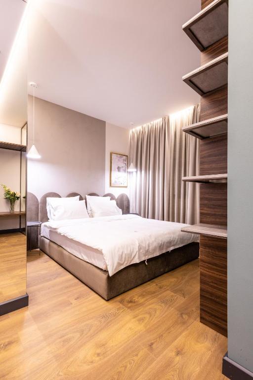 Postel nebo postele na pokoji v ubytování Allure Boutique Hotel