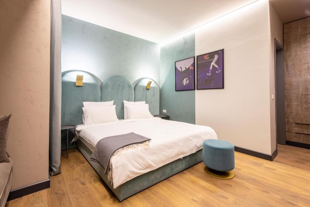 Postel nebo postele na pokoji v ubytování Allure Boutique Hotel